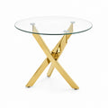 Table ronde en verre avec pieds en métal doré